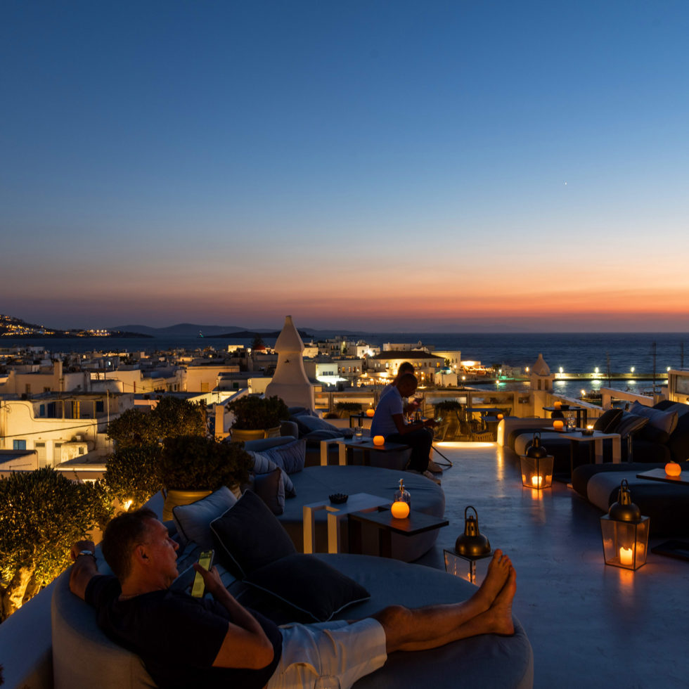 The TownHouse SKYBAR Roof top photo of man relaxing